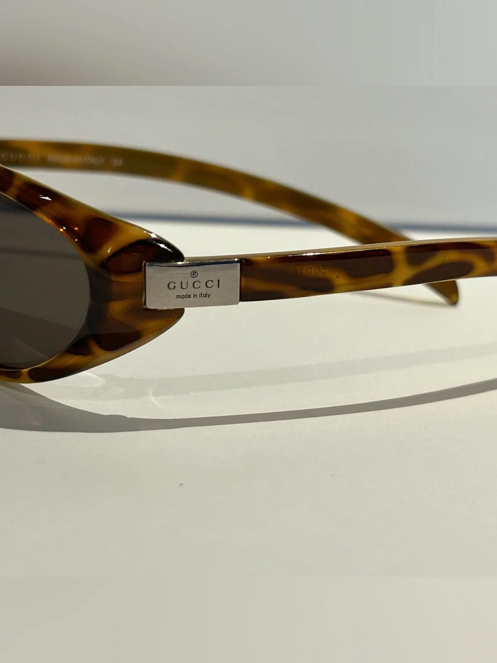 Gucci Tortoiseshell Oval Sunglasses with Brown Lenses